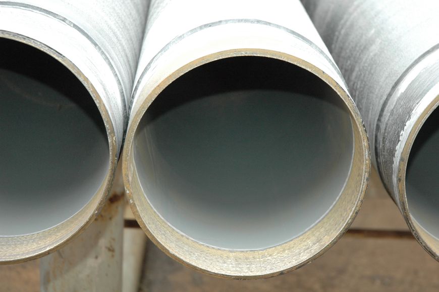 Трубы стальные с внутренним полимерным покрытием  и наружной изоляцией усиленного типа